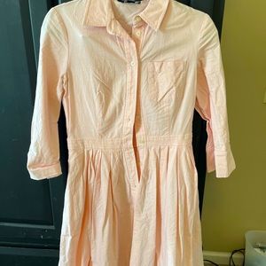 Super cute pink chambray button down dress